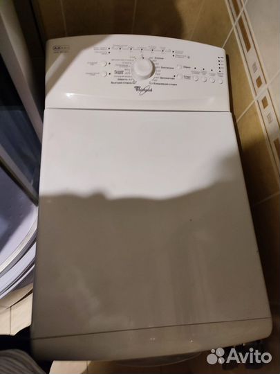 Стиральная машина с вертикальной загрузкой