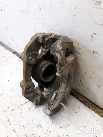 Суппорт передний левый Daewoo Nexia