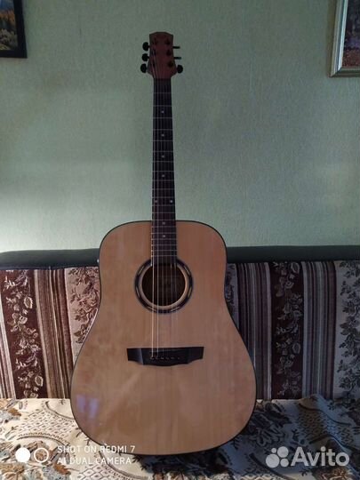 Акустическая гитара