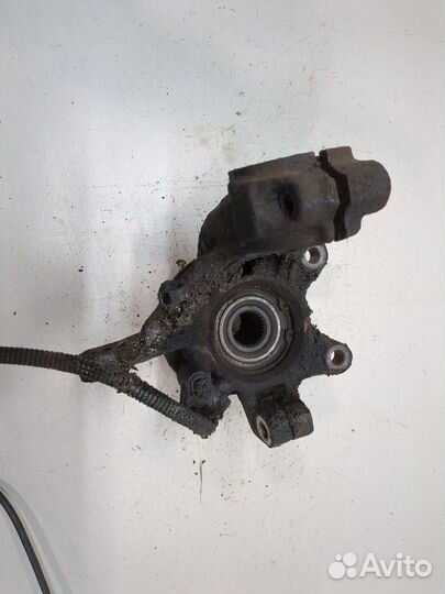 Ступица (кулак, цапфа) левая передняя Ford Cougar