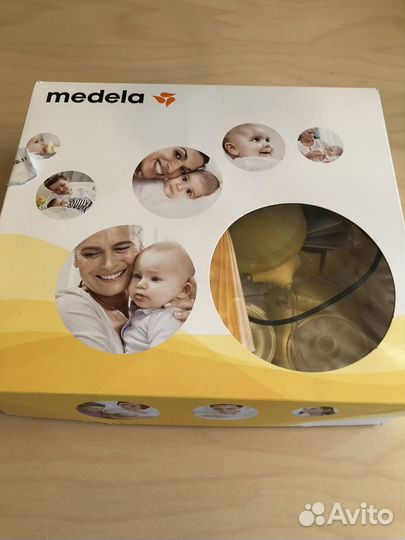 Молокоотсос medela swing maxi