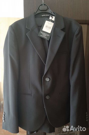 Школьный костюм для мальчика 134 новый