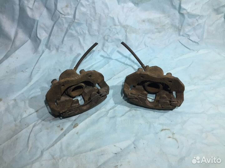 Суппорт передний правый левый Mazda 3 BL BK