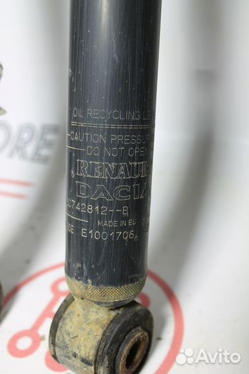 Задний амортизатор Рено Логан