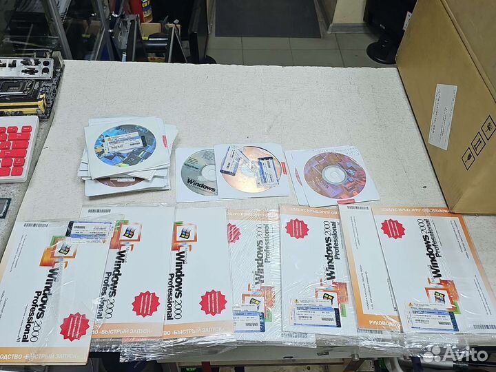 Windows 2000Pro 29наклеек 23диска 7конвертов