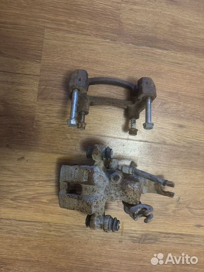 Суппорт задний левый kia spectra