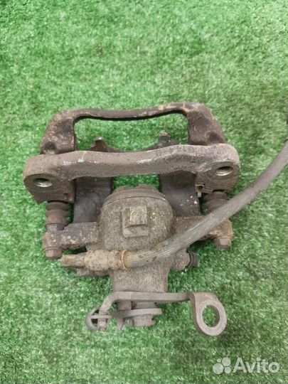 Суппорт тормозной задний правый Dodge Journey 2.4