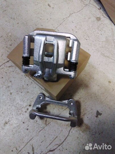 Суппорт задний lacetti gentra