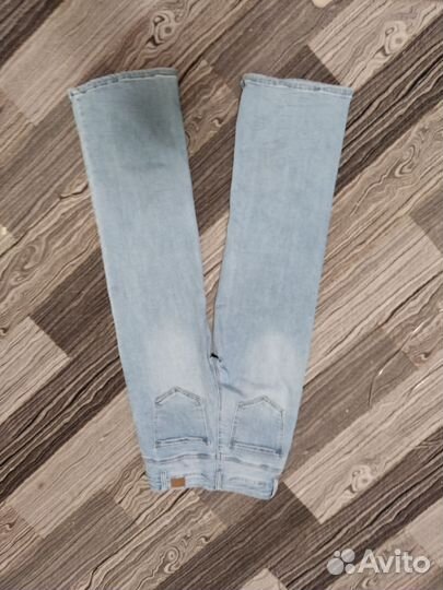 Джинсы голубые