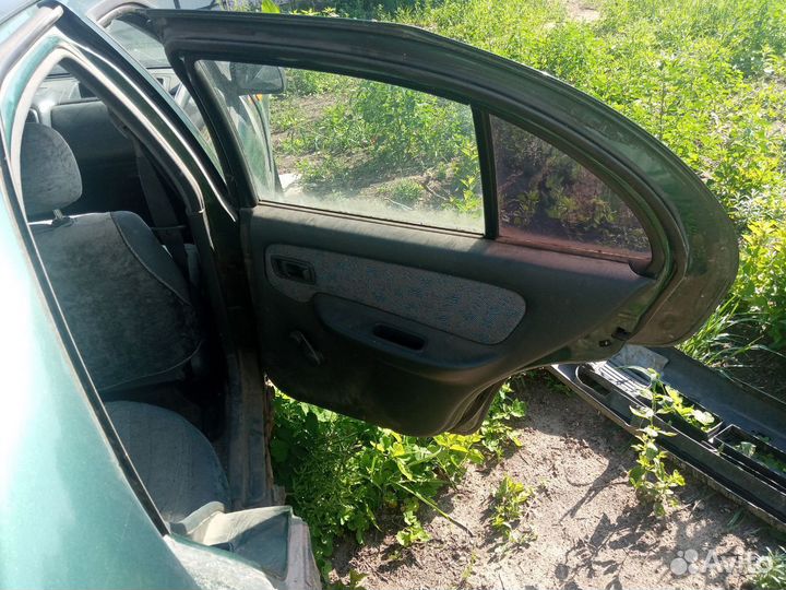 Стеклоподъемник задний правый Nissan Almera N15