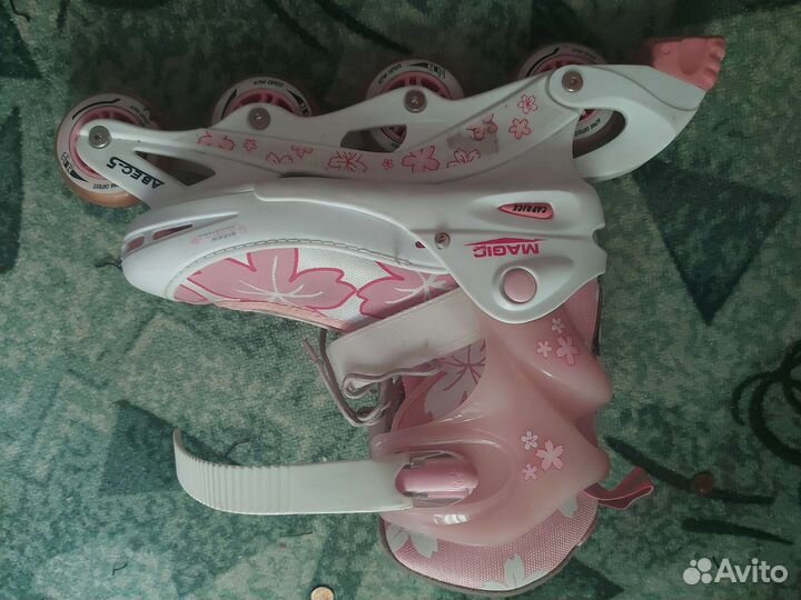 Роликовые коньки