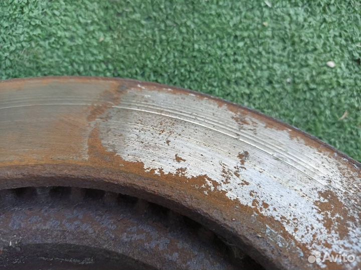 Тормозной диск передний Mitsubishi Lancer 9