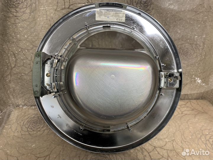Люк стиральной машины Miele