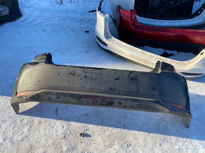 Задний бампер Toyota Corolla E210