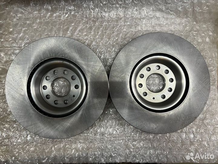 Диск тормозной передний Volkswagen Passat 2010