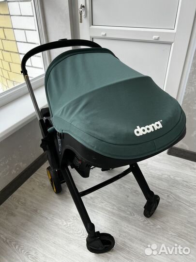 Коляска автокресло doona с базой isofix