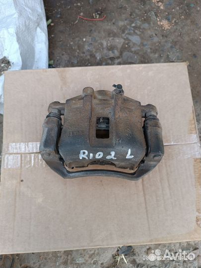 Суппорт передний левый Kia Rio 2