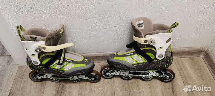 Роликовые коньки