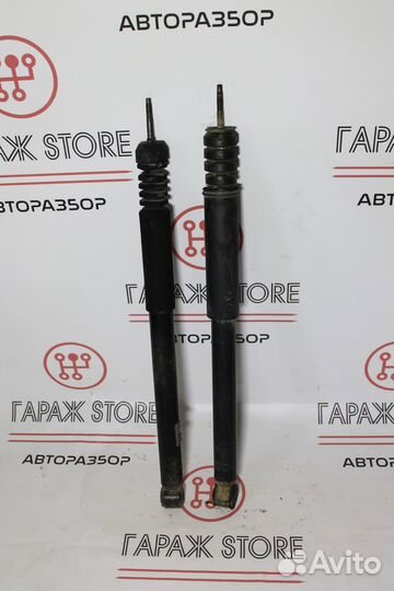 Задний амортизатор Рено Логан