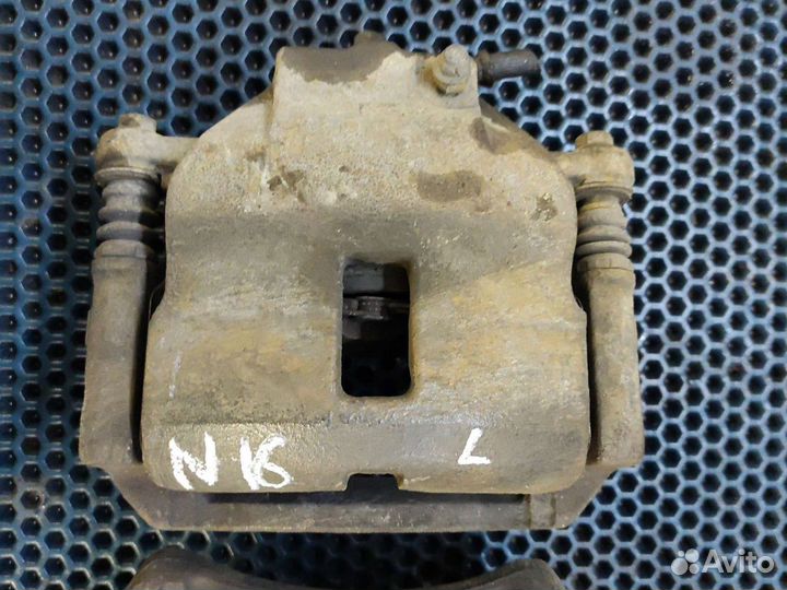 Суппорт передний Nissan almera n16