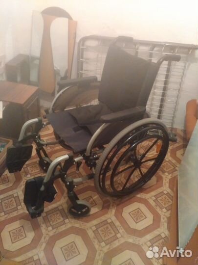 Инвалидная коляска