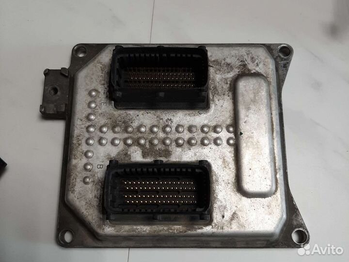 Блок управления двигателем на opel астра н