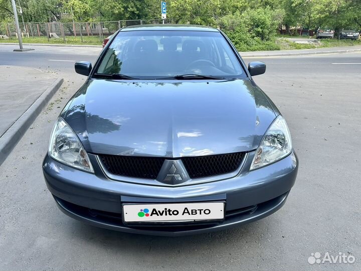 Mitsubishi Lancer 1.6 МТ, 2009, 124 530 км