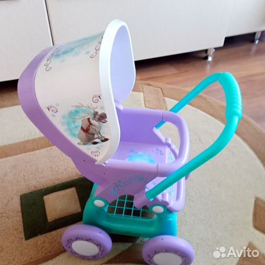 Детская игрушечная коляска