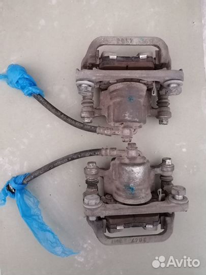 Nissan qashqai суппорт тормозной задний