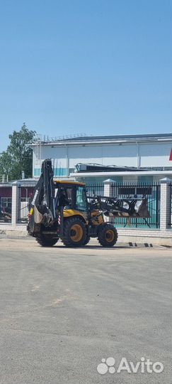 Услуги экскаватора погрузчика с гидромолотом