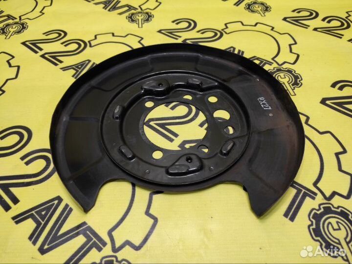 Щиток тормозного механизма задний левый Nissan