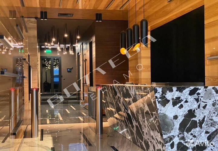 Изготовление стойки ресепшн из керамогранита