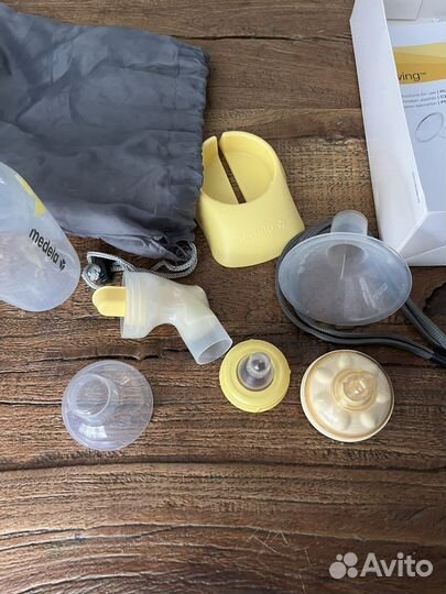 Молокоотсос medela электрический