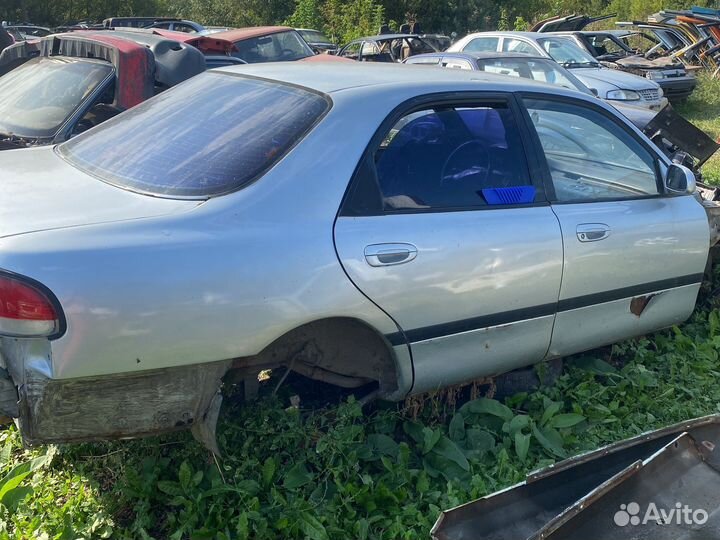 Дверь mazda 626 ge