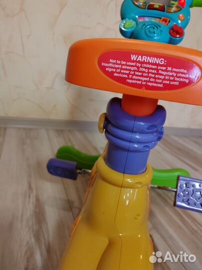 Жираф велотренажёр детский