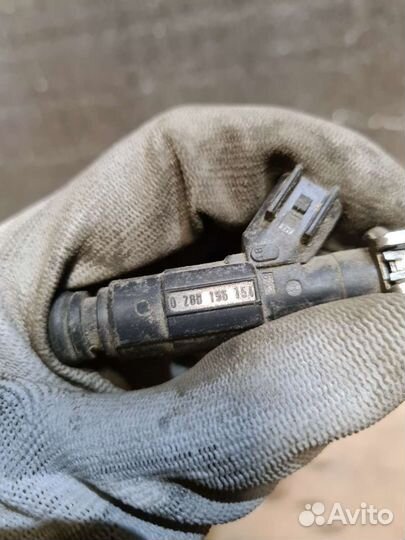 Топливная рампа форсунка Mazda Ford 2.0