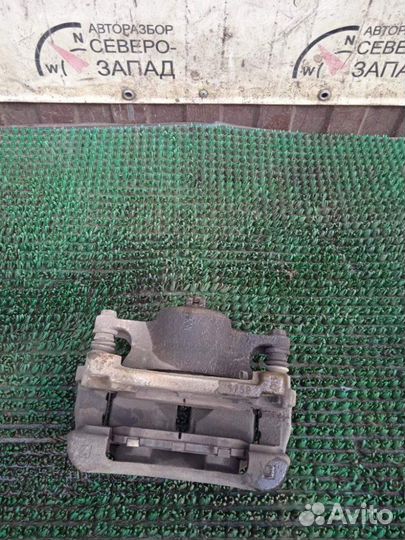 Суппорт передний левый Nissan Qashqai J11 MR20DD