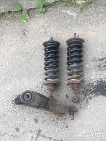 Nissan Pathfinder R51 Стойка амортизатора передняя