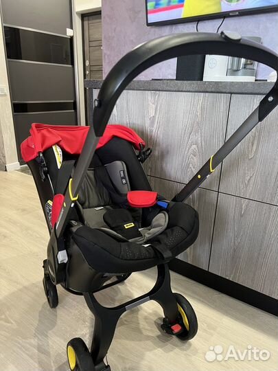 Коляска автокресло doona с базой isofix