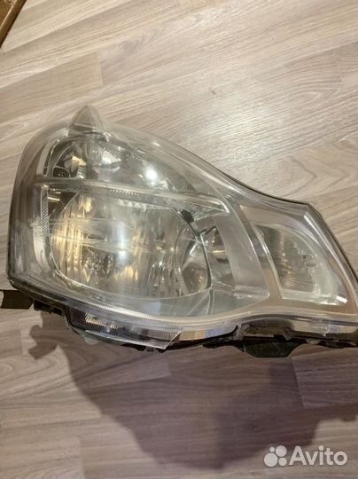 Фара правая оригинал nissam almera g15
