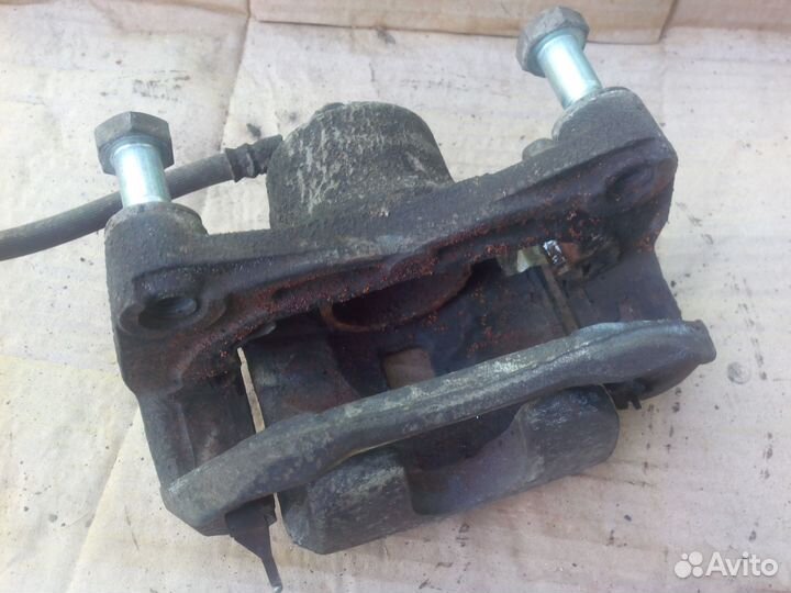 Суппорт тормозной Ниссан Теана 32