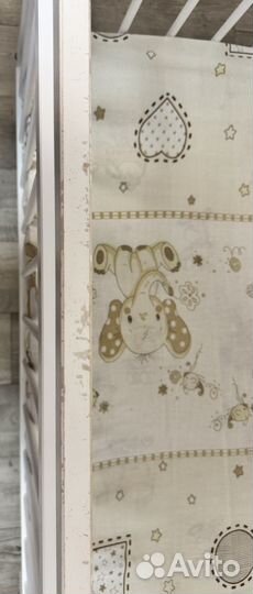 Детская кроватка с продольным маятником