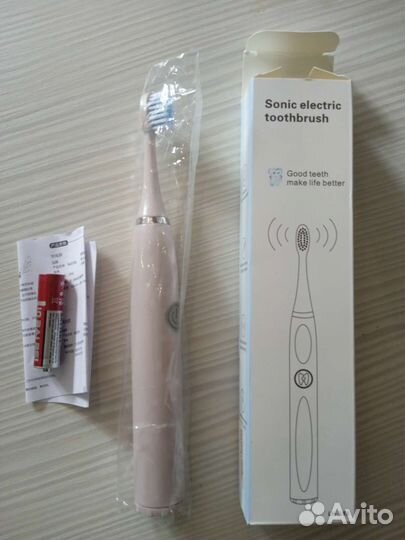 Электрическая зубная щетка новая