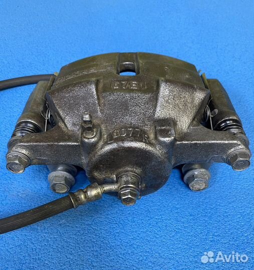 Суппорт тормозной перед. левый Nissan X-Trail T32