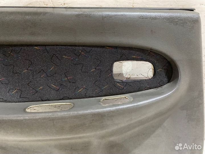 Обшивка боковой двери задняя левая Kia Spectra