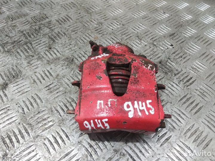 Суппорт тормозной передний правый Volkswagen Golf