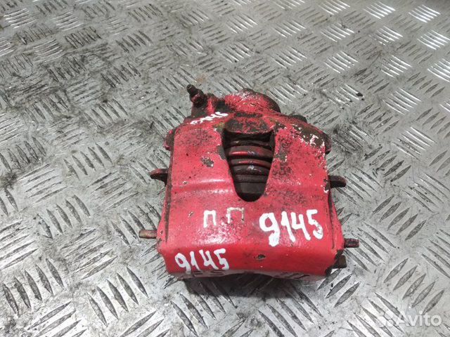 Суппорт тормозной передний правый Volkswagen Golf