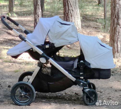 Коляска для двойни baby jogger city select
