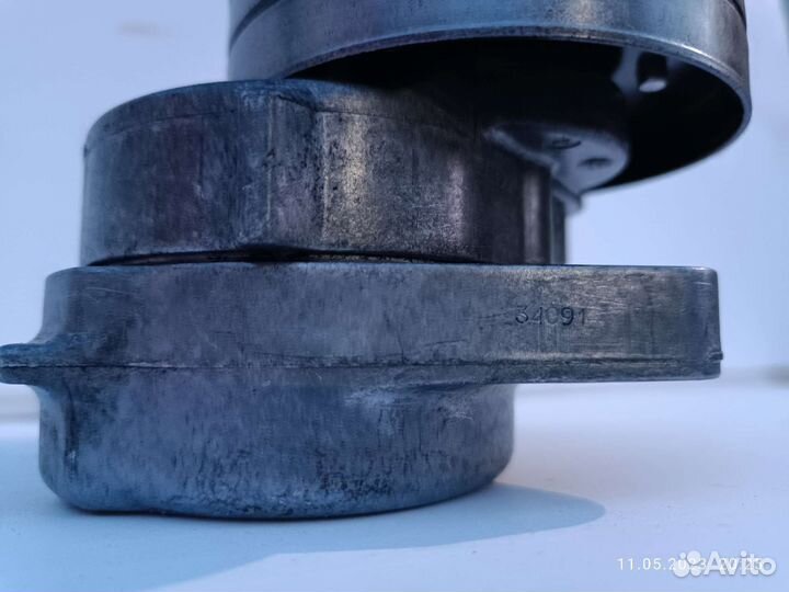 Натяжной ролик