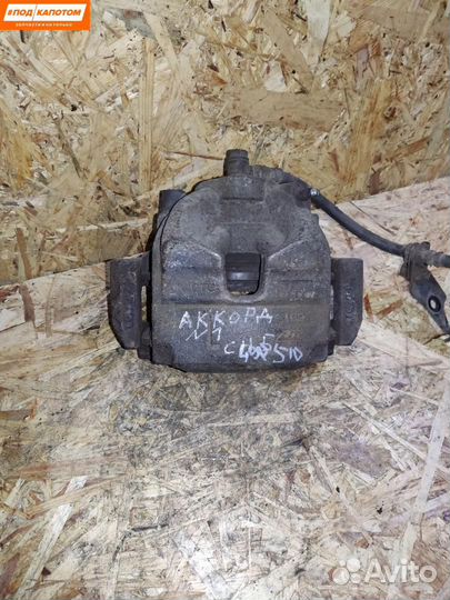 Суппорт тормозной передний левый Honda Accord 8